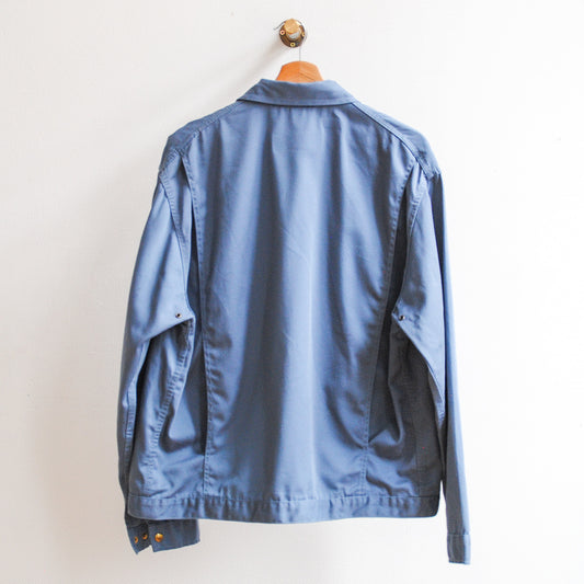 grijsblauwe-vintage-werkjas-achterkant