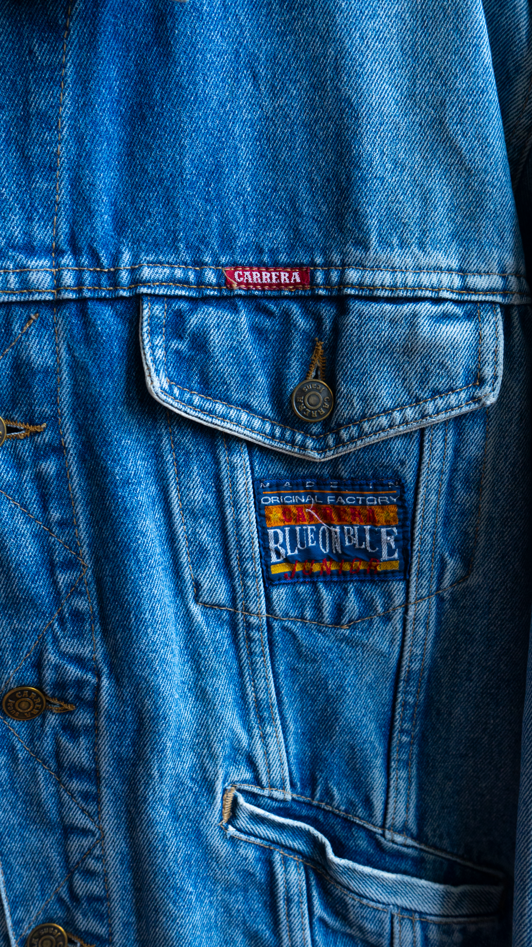 90s vintage jeans jacket by Carrera detail of chest pocket branding
