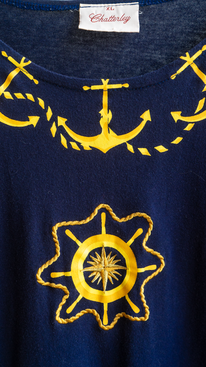 detail of gold anchor and steering wheel   slash compass design on navy vintage nightwear t-shirt fresh vintage
