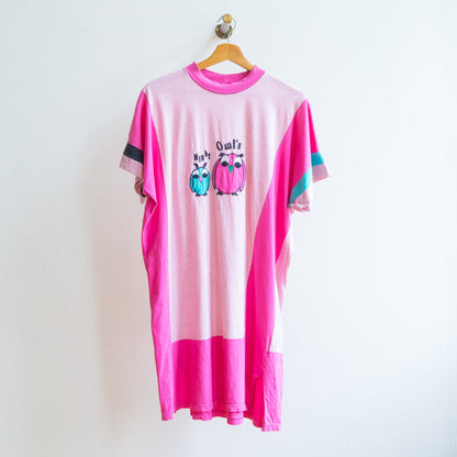 Dress or oversized t-shirt from the 80s with owl design and text nigh owls on a hanger