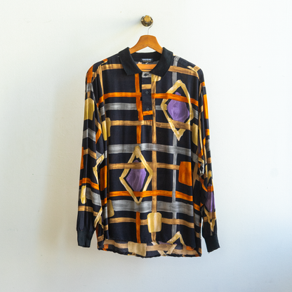 black vintage shirt with abstract pattern in multi colors such as orange and beige having long sleeves by '90s vintage brand système nouveau made in belgium fresh vintage