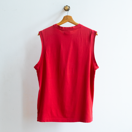 red secondhand sleeveless Puma top with low side cut-outs