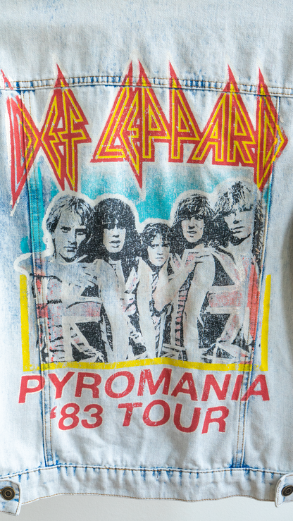 detail of vintage denim jacket of Def Leppard with 'Pyromania '83 Tour' design on the back of the jacket