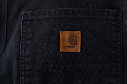 zwarte-carhartt-jeans-met-bruin-carhartt-logo