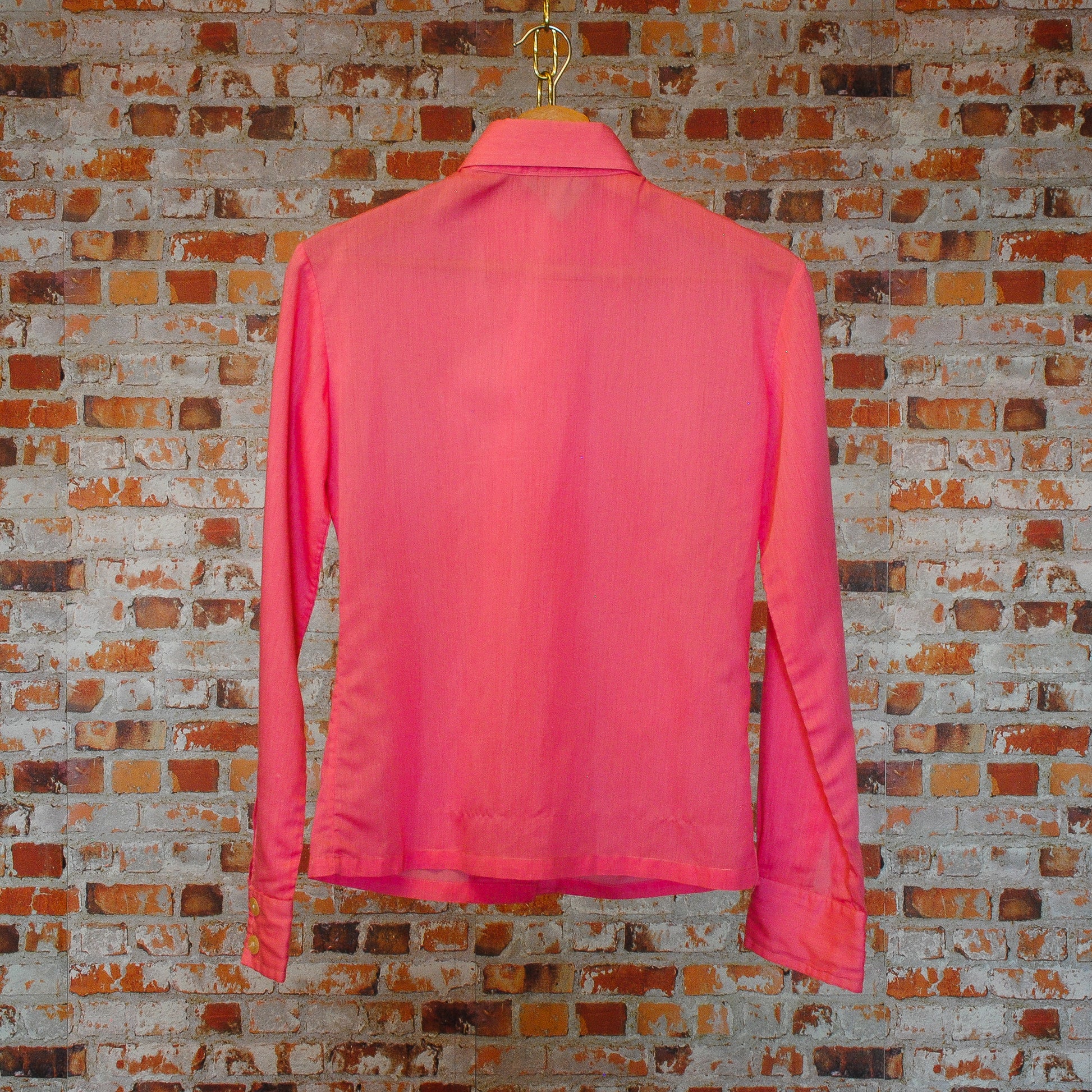 soft-pink-secondhand-blouse-on-hanger-back