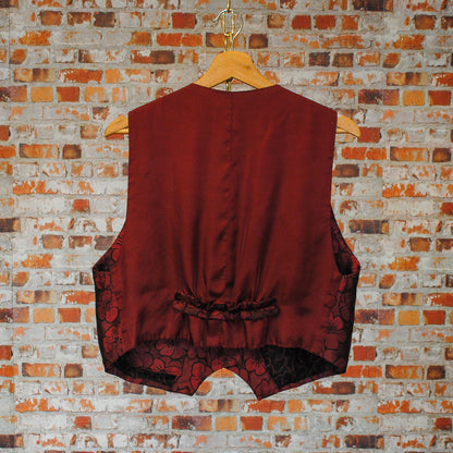 jaren-90-gilet-in-bordeaux-met-bloemen-patroon-achterkant